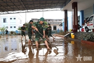 Military forces rush to help flood-hit people in Central Vietnam